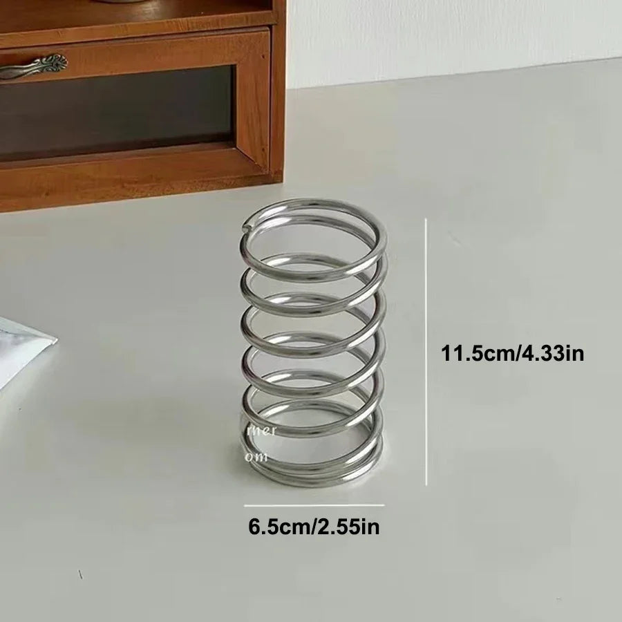 Spring Toothbrush Holder