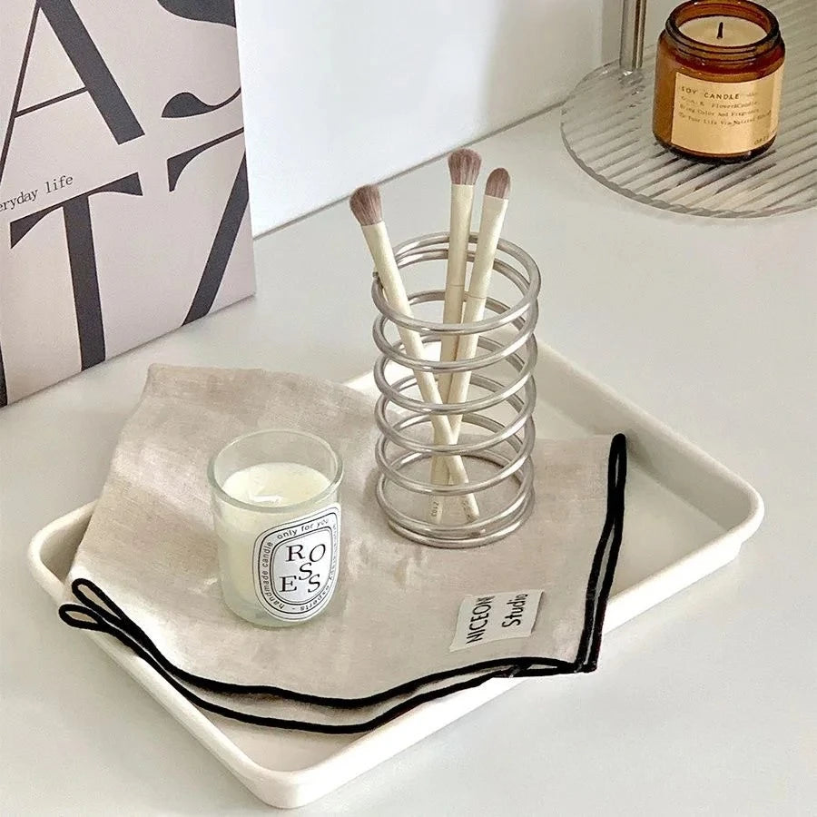 Spring Toothbrush Holder