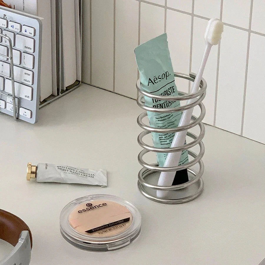 Spring Toothbrush Holder